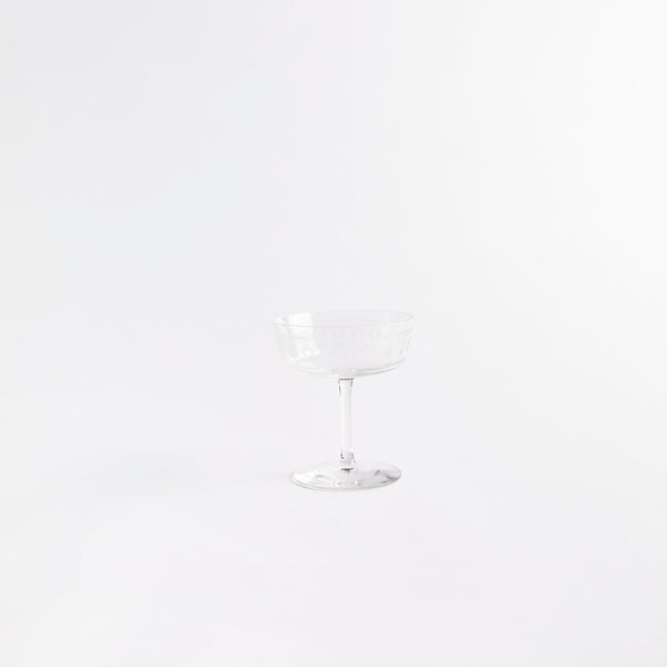 Clear champagne glass.