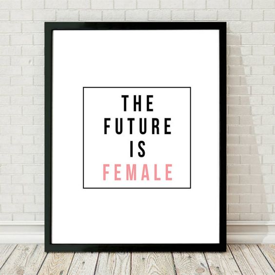 Framed photo with text saying, "The Future is Female". 