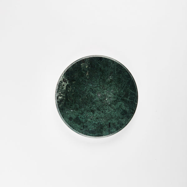 Green circular marble board.