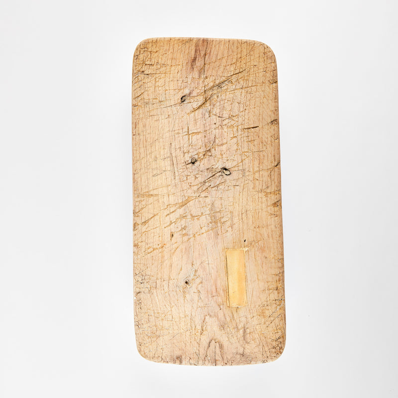 Raised long wooden board.