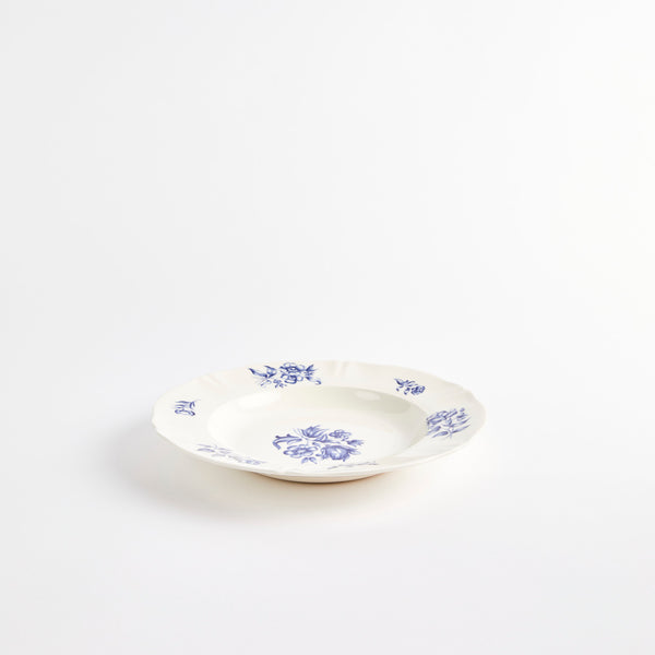 White bowl with blue floral design.