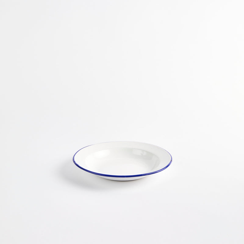 White bowl with blue rim. 