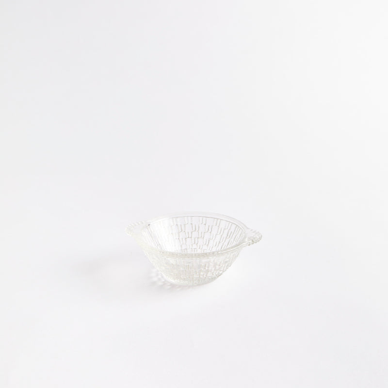 Clear glass bowl with embossed checkered design.