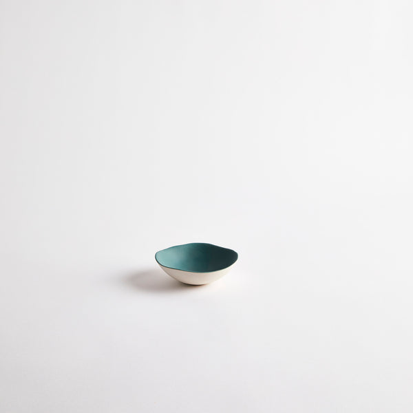 White with teal interior ceramic bowl.