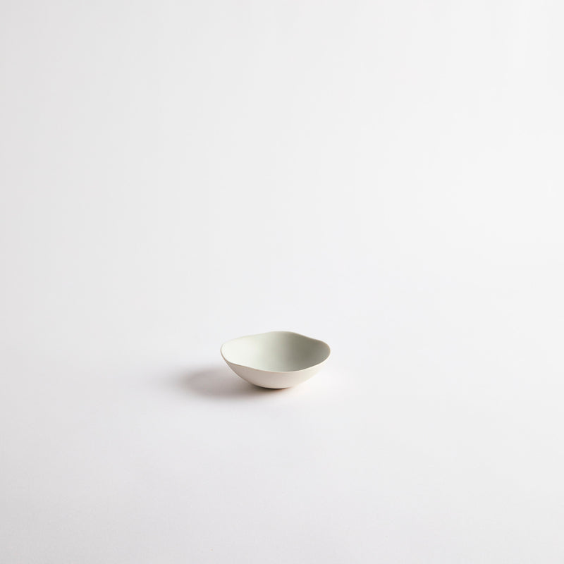 White with pale blue interior ceramic bowl.