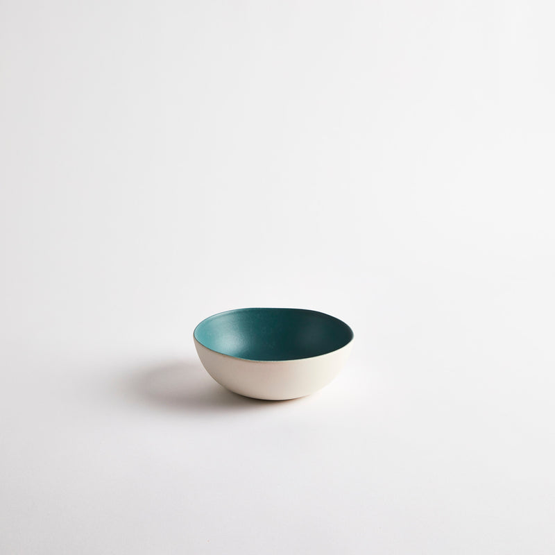 White with teal interior ceramic bowl.