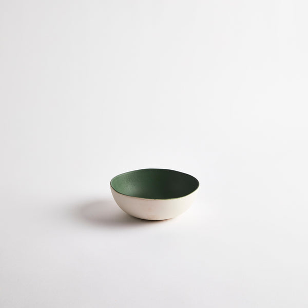 White with green interior ceramic bowl.