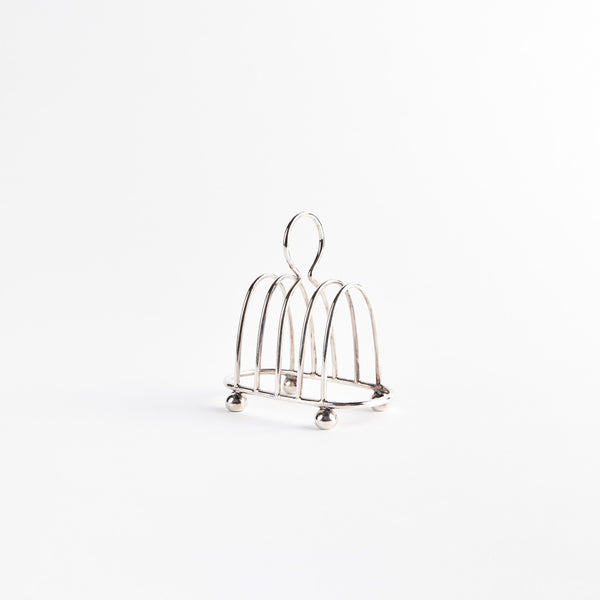 Silver toast rack.