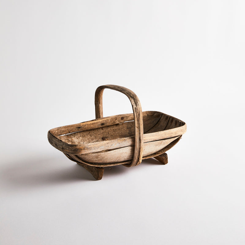 Brown wooden trug basket.