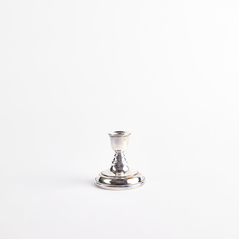 Silver candle holder.