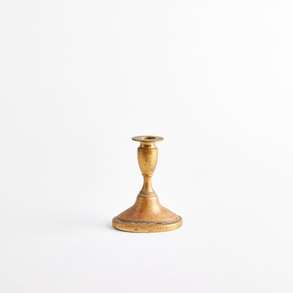 Gold candle holder.