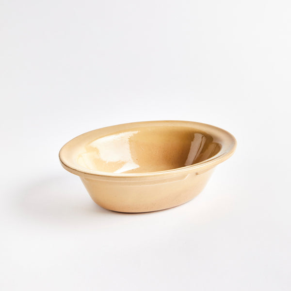 Brown ceramic dish.