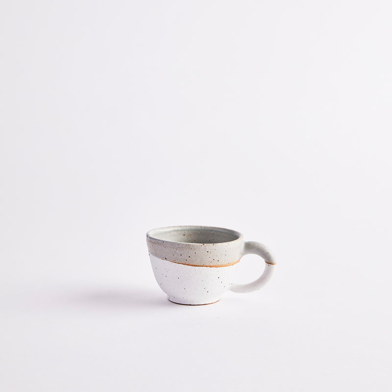 White and grey coffee cup.