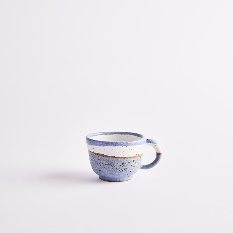 Blue and white coffee cup.