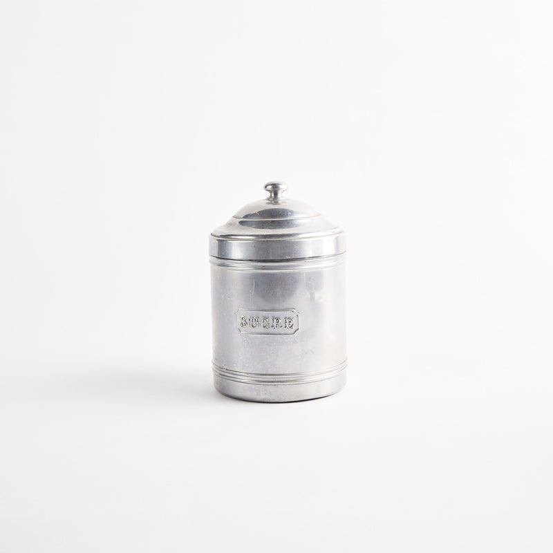 Silver metal container.