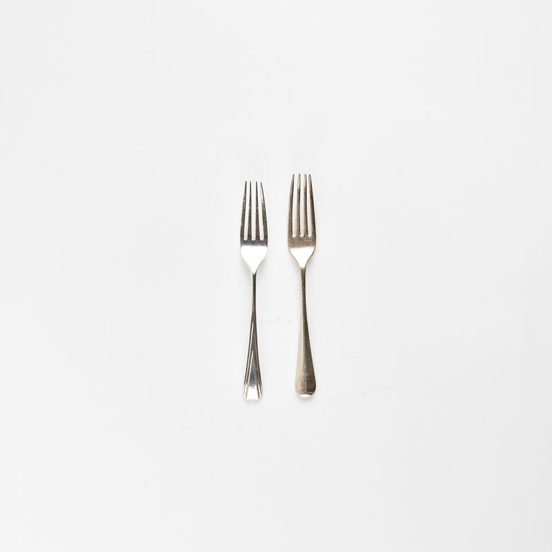Two silver forks.