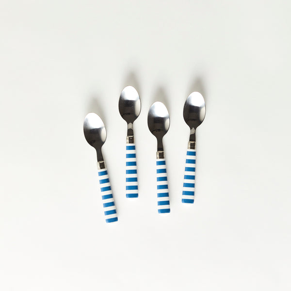 Four silver spoons with blue and white striped handle.