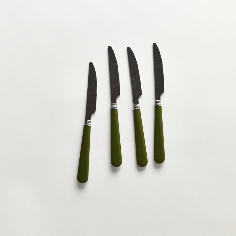 Four silver knives with green handle.