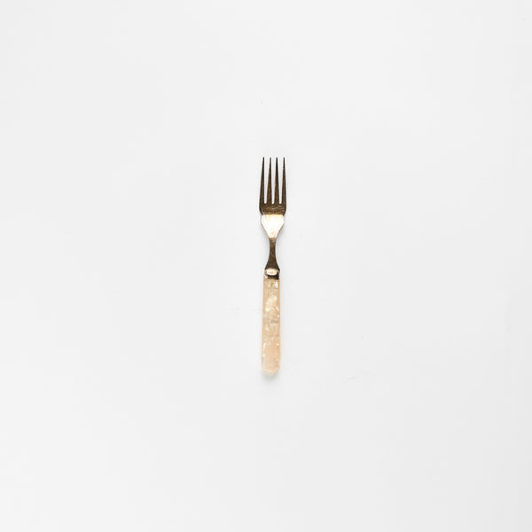 Silver fork with pearl handle.