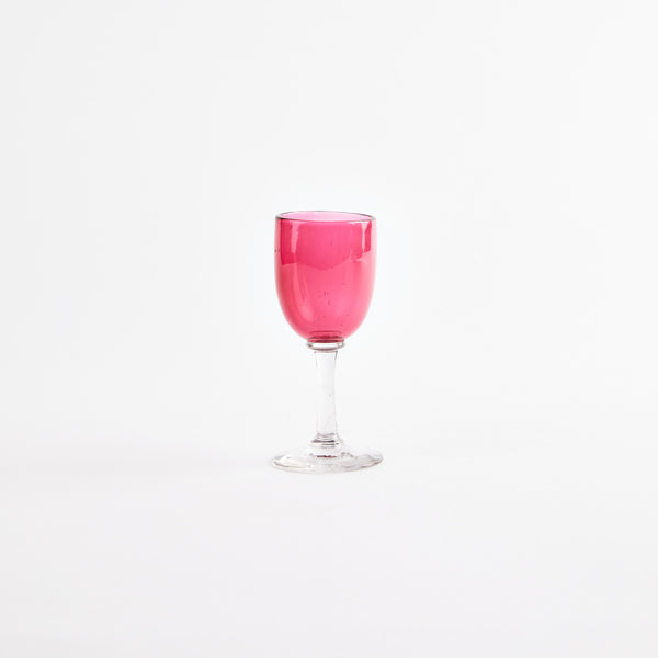 Pink wine glass.