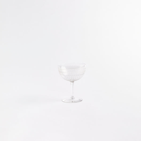 Clear champagne glass.