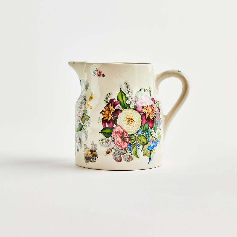Cream with multicolour floral design jug.
