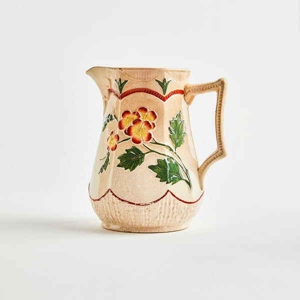 Cream and red floral jug.