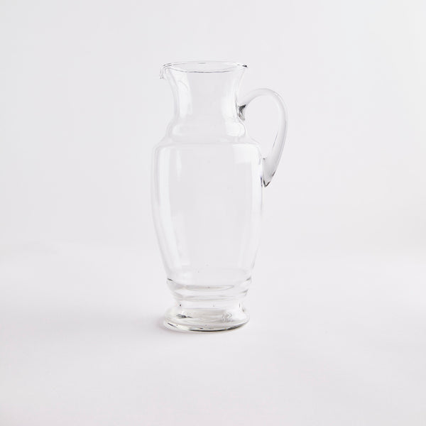 Clear glass jug.