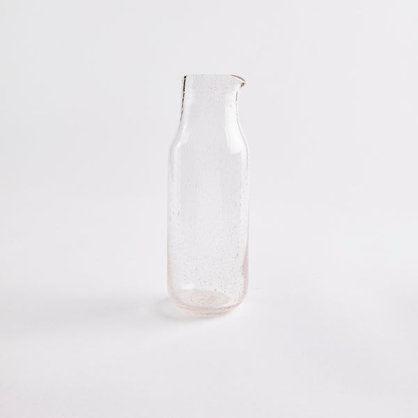 Clear glass bubble jug.