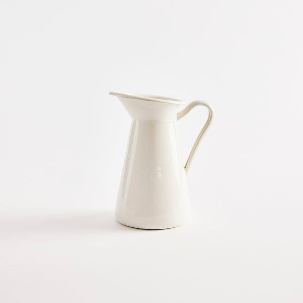 White metal jug.