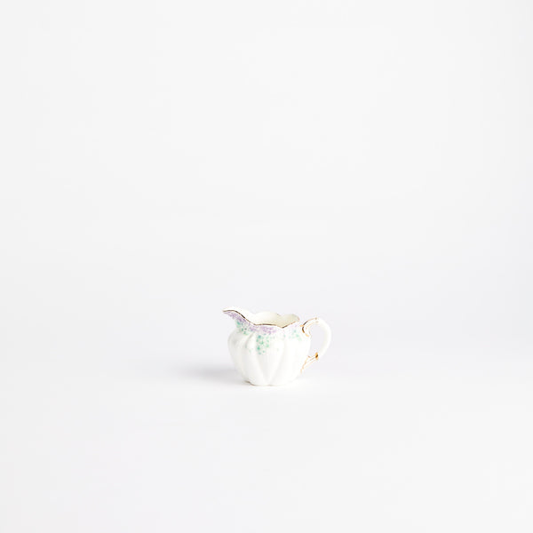 White China jug with floral design.