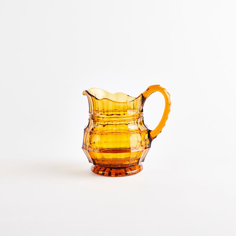 Amber glass jug.