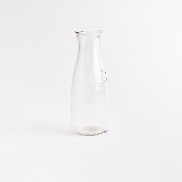 Clear glass jug.