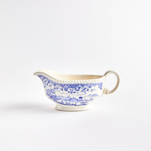 Cream jug with blue traditional Oriental design.