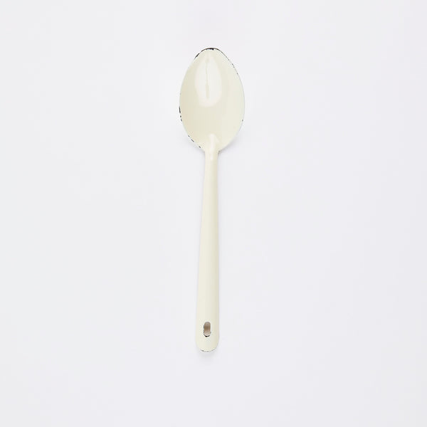 White enamel spoon.