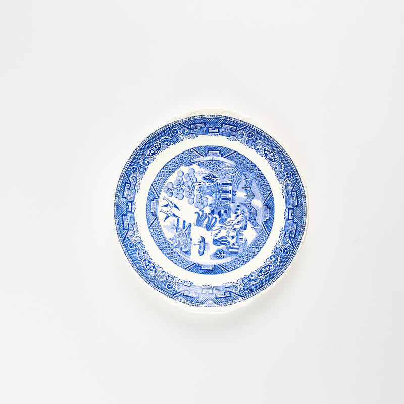 White plate with blue detail decoration.