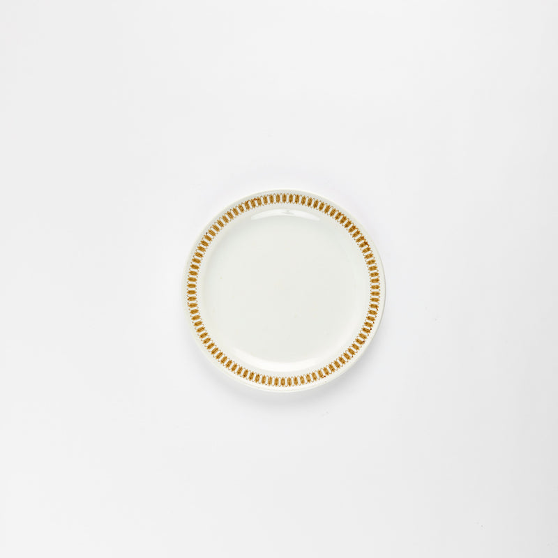 White plate with beige rim detail.