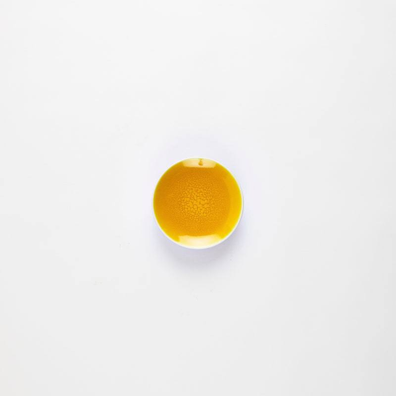 Yellow glazed plate.