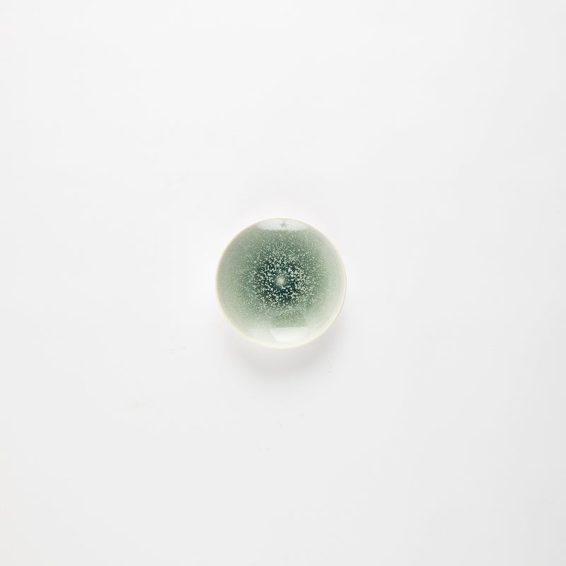 Green with speckles plate.