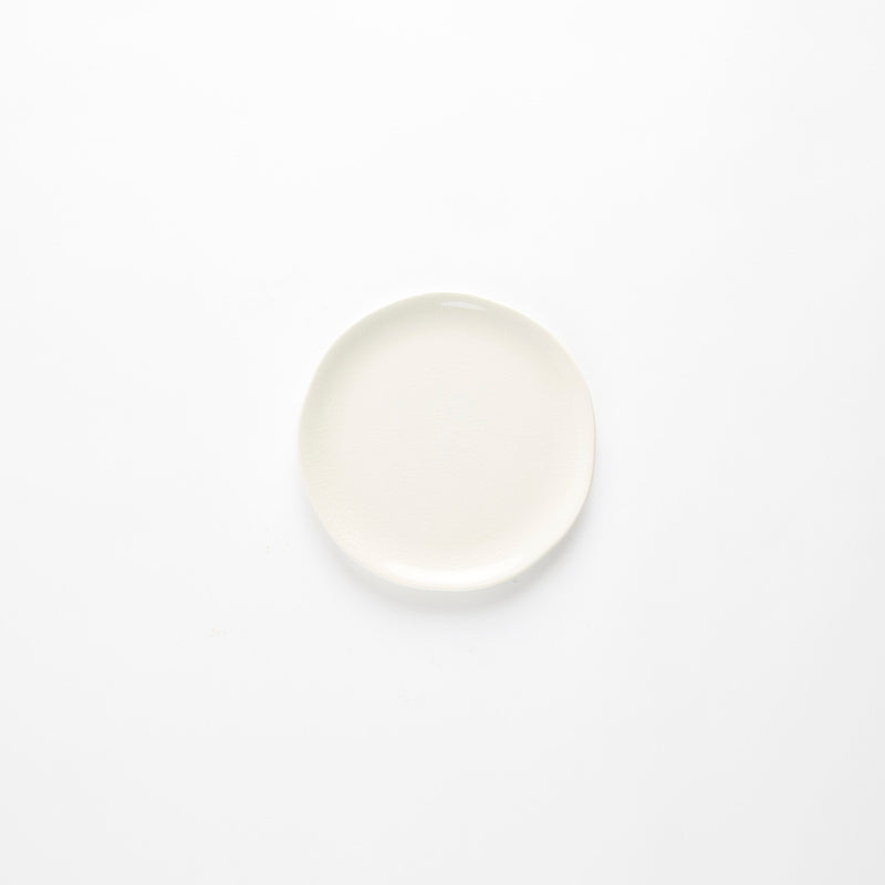 Cream glazed plate.