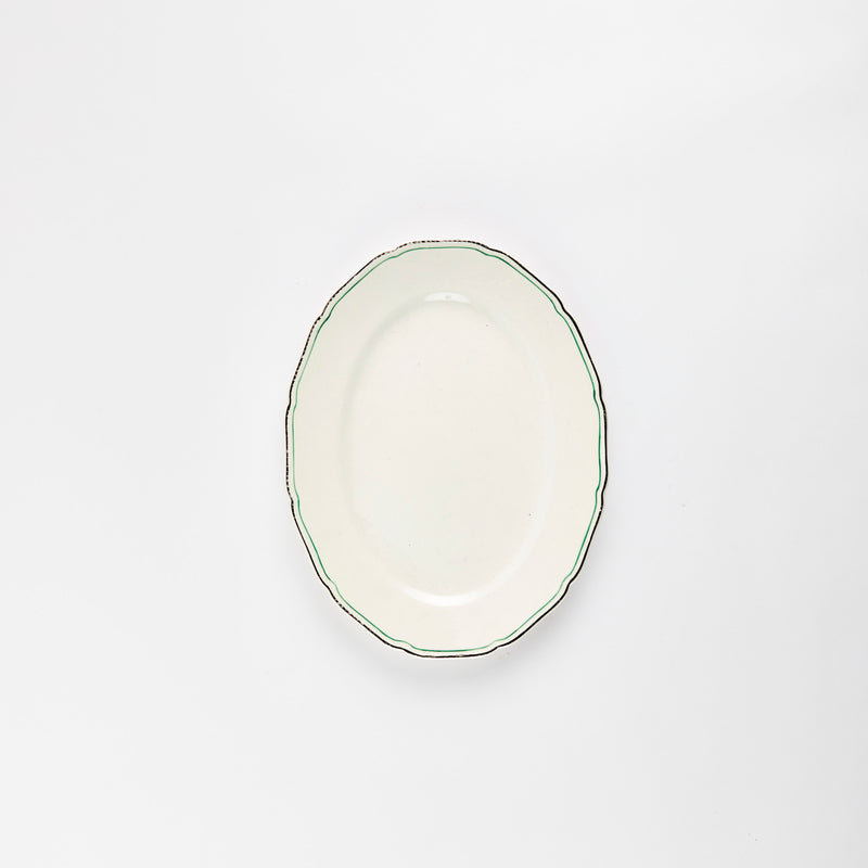 White with green and silver rim platter.