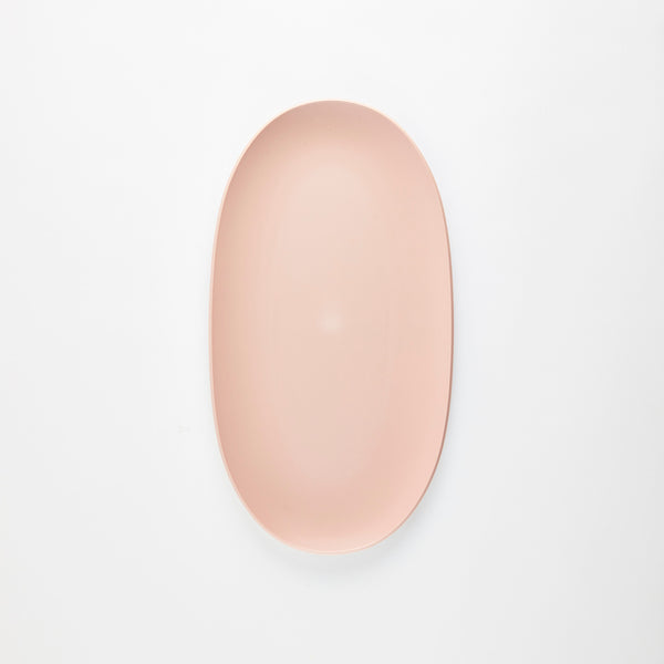 Pink plastic oval platter.