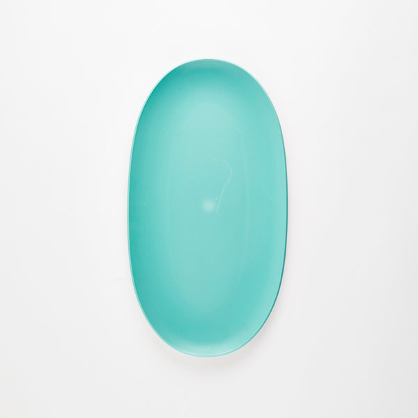 Turquoise oval plastic platter.