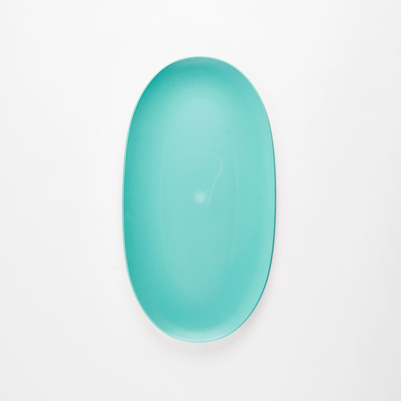 Turquoise oval plastic platter.