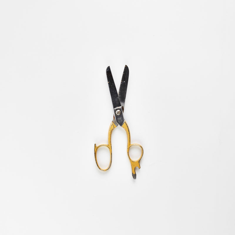 Yellow and silver scissors.