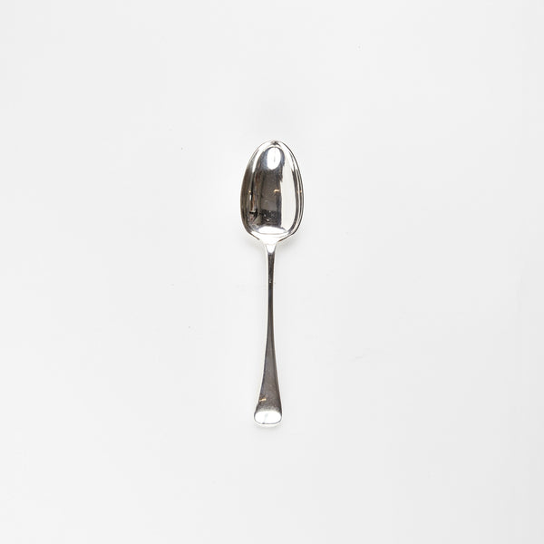 Silver serving spoon.