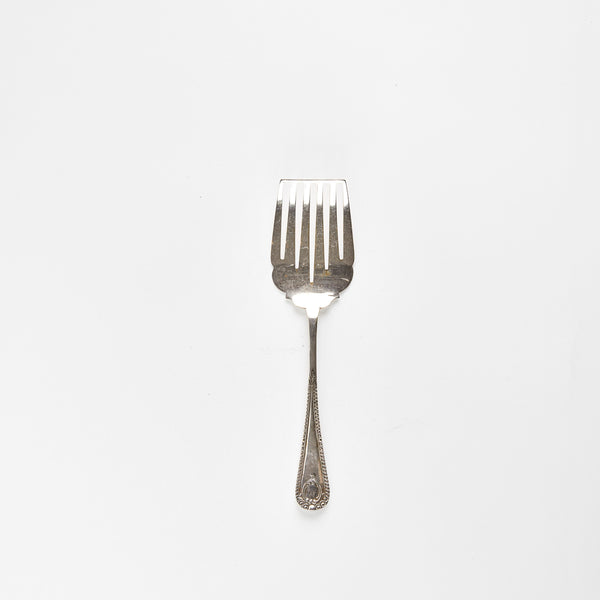 Silver slotted fish slice server.