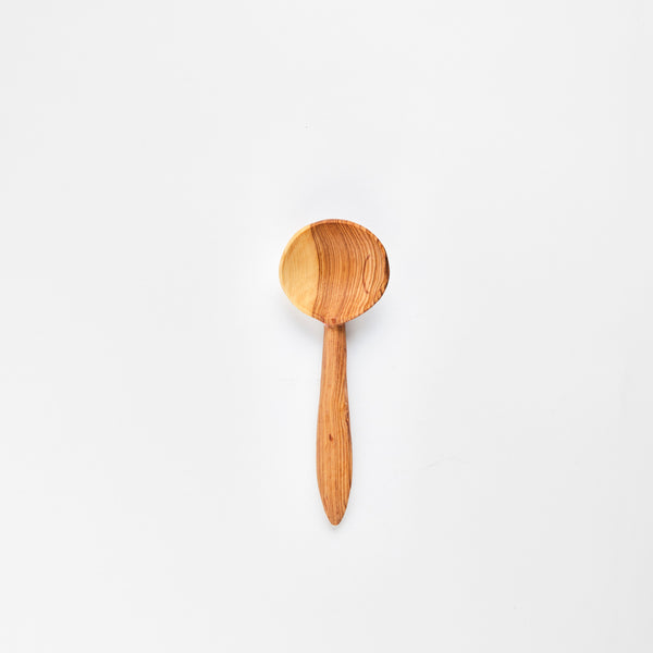 Wooden serving spoon.