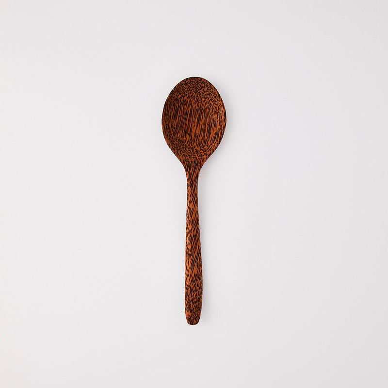 Dark wooden serving spoon.