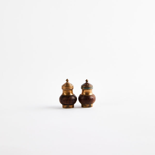 Gold and wooden shakers.